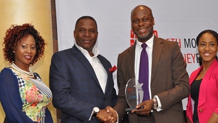 (L-r): Grace Mlimo, Regional Business Development Director, Clickatell, Samson Isa  Director West Africa, Clickatell,  receives Kalahari Awards from former MD of ATMC, Noble Ekajeh while Digital Campaign Manager, Clickatell, Alaba Ephraim looks on at the award ceremony in Lagos.